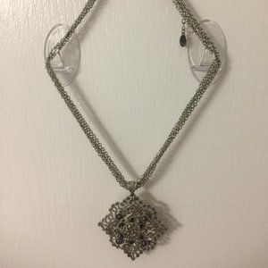 Multi silver chain necklace with silver pendants